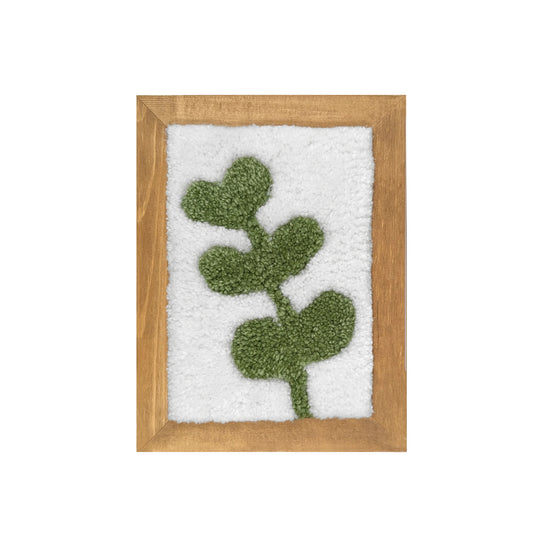 Tableau design floral fabriqué en laine avec un cadre bois brut